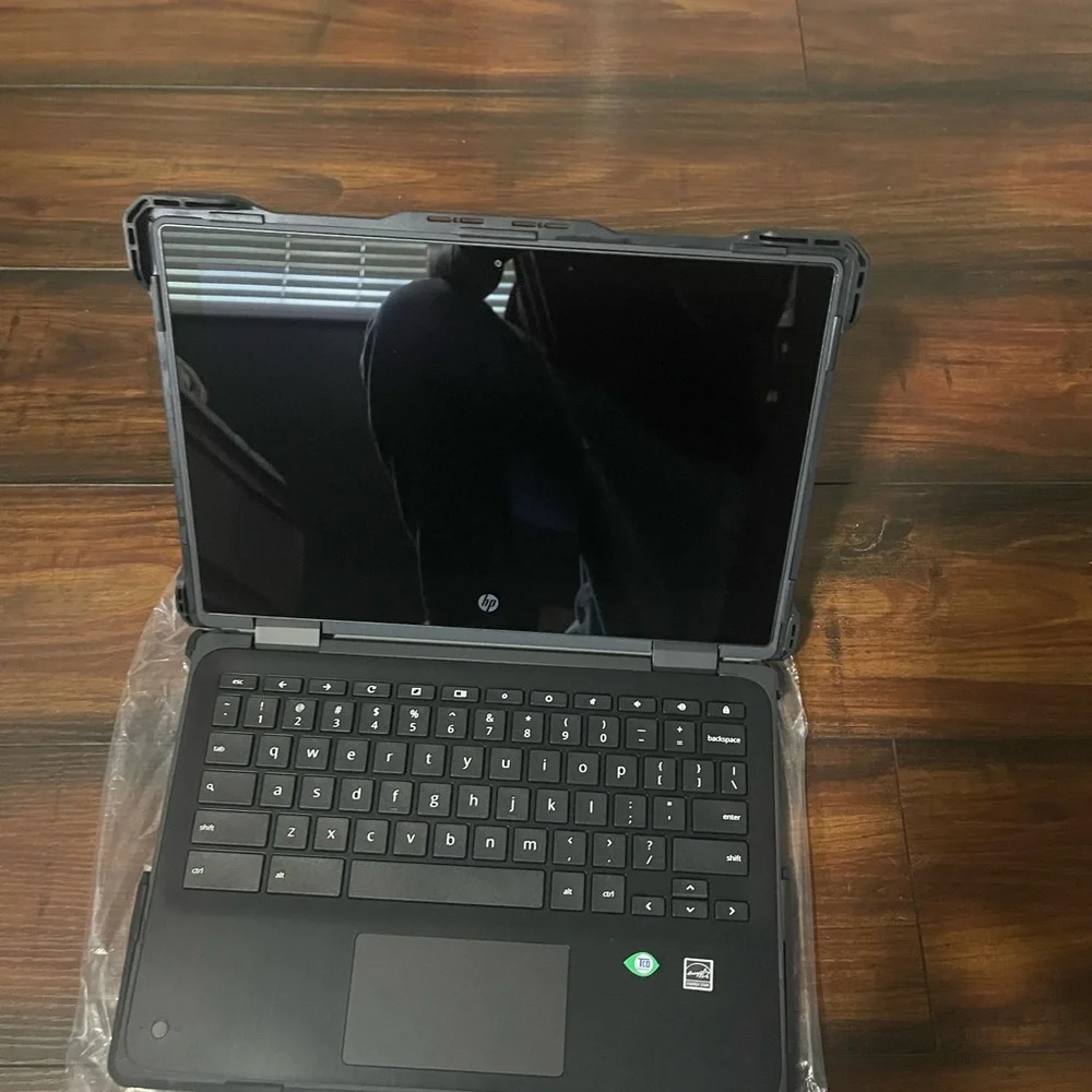 Brand NEW with a Brand NEW CASE TOUCHSCREEN and is adjustable 2-1 laptop/tablet.